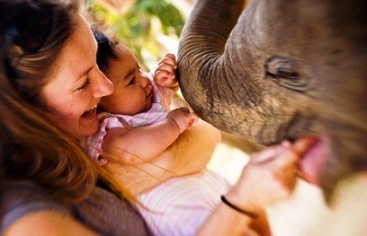 Child and Baby Elephant, India